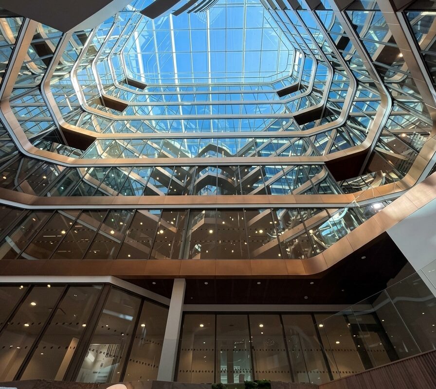 Looking up through the glazed atrium of Snäckan 8 in Stockholm towards the skylight