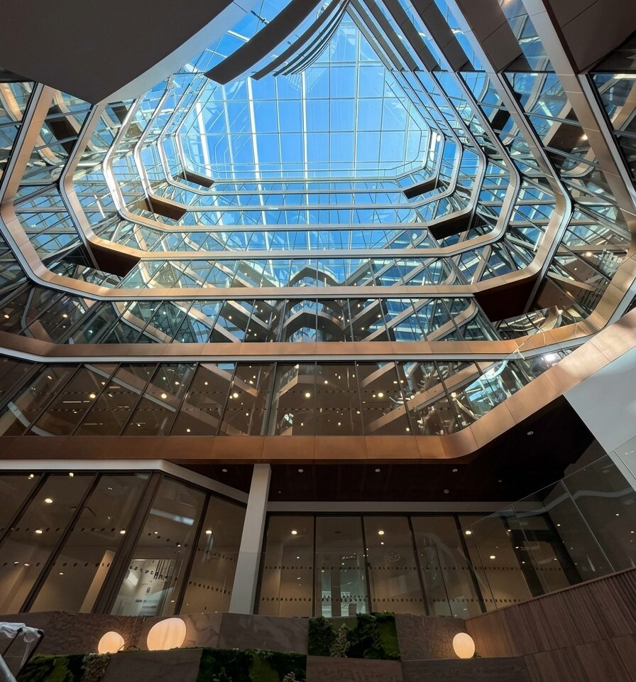 Looking up through the glazed atrium of Snäckan 8 in Stockholm towards the skylight