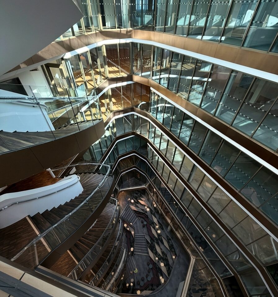 Glass atrium facades on every floor of Snäckan 8, seen from above